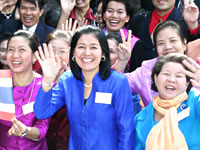 The members of Thailand with a broad smile